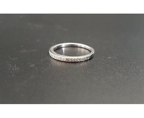 DIAMOND HALF ETERNITY RINGin eighteen carat white gold, the diamonds totalling approximately 0.16cts, ring size J-K and appro