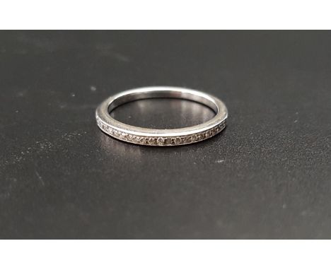DIAMOND HALF ETERNITY RINGin eighteen carat white gold, the diamonds totalling approximately 0.16cts, ring size J-K and appro