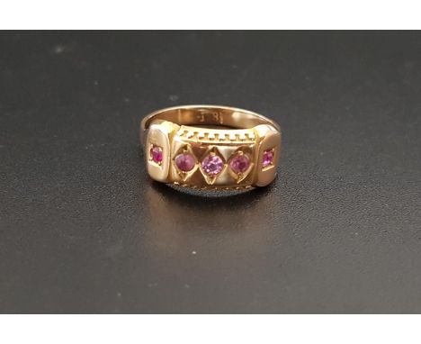RUBY AND PINK TOURMALINE SET RINGthe three central pink tourmalines flanked by a ruby to each shoulder, on eighteen carat gol