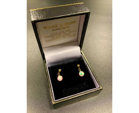 PAIR OF OPAL DROP EARRINGSthe spherical opal drops in nine carat gold 