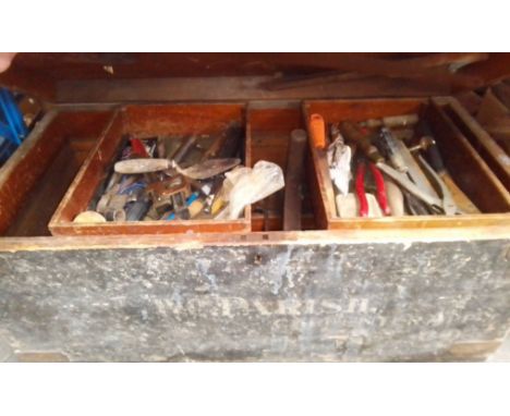 A large wooden carpenters tool chest from Royal Navy dockyard, Devonport. Complete with large collection of tools  
