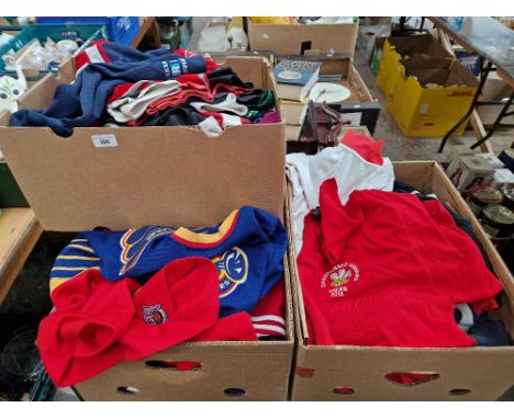 Three boxes of assorted rugby, cricket and other sporting jerseys.