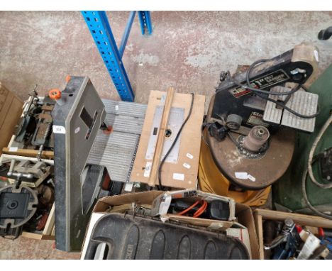 A Black &amp; Decker band saw, a Clarke belt sander and a router.  