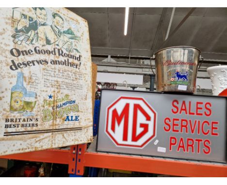 An MG 'Sales, Service, Parts' light up garage sign together with a FA Premier League champagne ice bucket.  