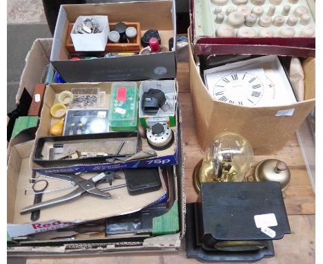 Three boxes of watch and clock spares together wit tools, also a Mantel clock with key and pendulum, a brass German clock und