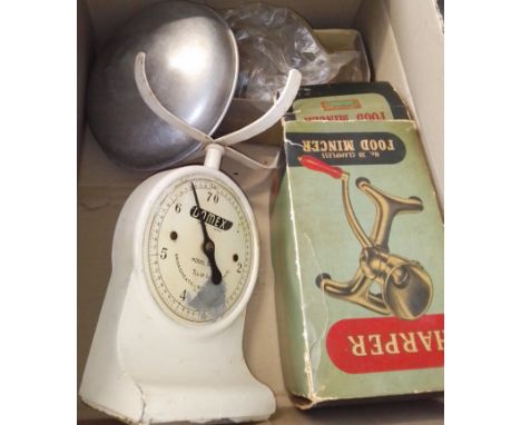 A mixed lot of vintage kitchenalia comprising scales, food mincer and an egg beater.  
