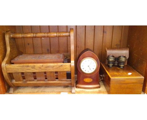 A collection of wooden ware to include magazine rack, carved wooden box, mantle clock by Boodle and Dunthorne, inlaid jewelle