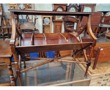 A Regency style mahogany book trough/table.  