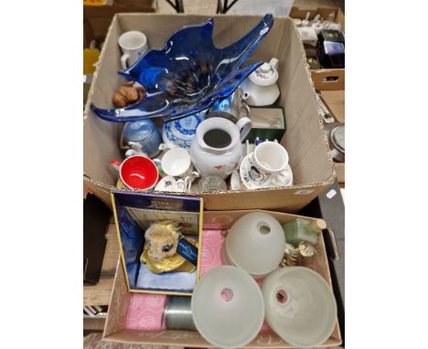 A mixed lot of ceramics and glass including a blue art glass centre piece, tea pots, light shades etc.  