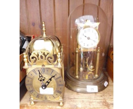 A 400 day German clock under glass dome and a brass lantern clock.  