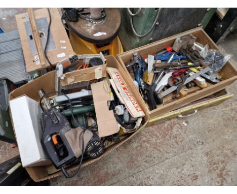 Four boxes of assorted power tools and hand tools.  