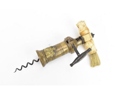 A 19th century brass barrel corkscrew with turned bone handle, coat of arms to barrel 