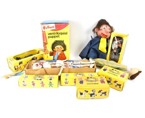 A collection of Pelham Puppets, to include two ventriloquial puppets (one boxed), a boxed Wombles puppet, cat, poodle, pig, e