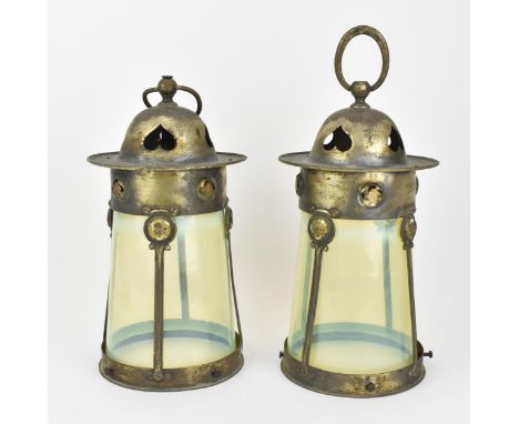 A pair of Arts &amp; Crafts brass mounted vaseline glass lantern shades, circa 1900-1910, the tapered cylindrical glass clad 