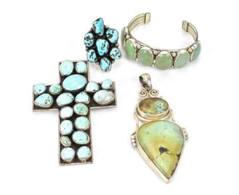 A small group of Native American Navajo white metal and fox mine turquoise jewellery, comprising a cross shaped pendant with 