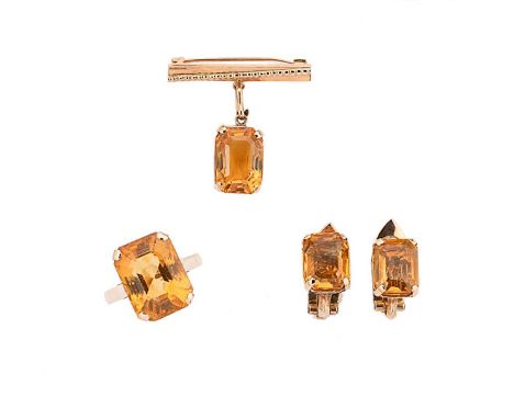 A citrine ring, brooch and a pair of ear clips, first, the ring set with an octagonal citrine, approximately 16.3 x 12.4mm, t