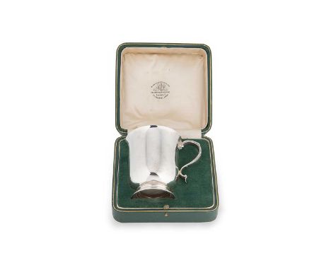 A George V silver christening tankard. mark of the Goldsmiths' &amp; Silversmiths' Company Ltd., London 1932, straight sided 