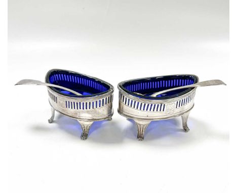 A pair of George III 18th century silver salts with later spoons, the salts each with mark of Solomon Hougham, London 1795, o