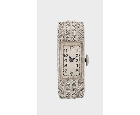Spera Watch Company, Tramelan - A Swiss platinum diamond set cocktail wristwatch head, circa 1950, rectangular white dial wit