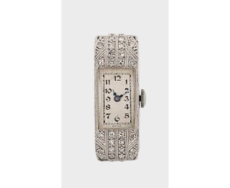 Spera Watch Company, Tramelan - A Swiss platinum diamond set cocktail wristwatch head, circa 1950, rectangular white dial wit