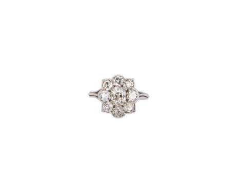 A diamond cluster ring, central old mine cut diamond, approximately 5.95 x 4.9mm, estimated approximate weight 0.63ct, assess