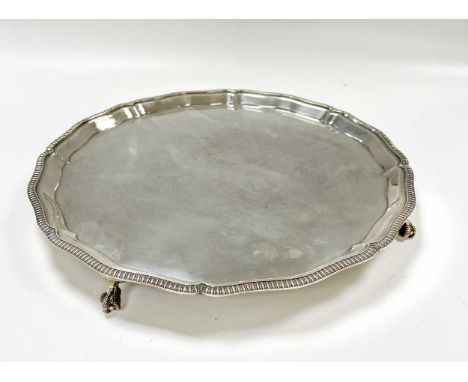 An Elizabeth II silver salver, mark of Elkington &amp; Company, Sheffield 1975, 'Chippendale' style with beaded edge, raised 