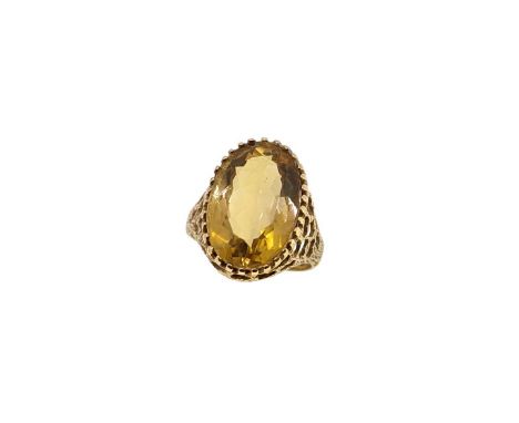 A late 20th century 9ct gold citrine dress ring, claw set oval faceted citrine, approximately 18.8 x 12.6 x 7.8mm, estimated 