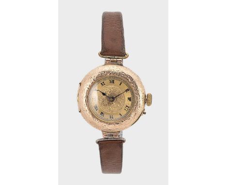 Dimier Frères & Cie, Genève - A 15ct gold wristwatch,  circa 1909, circular engine turned dial with floral inner, black Roman