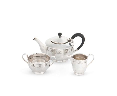 A George V silver Arts & Crafts style 3-piece tea set, mark of the Goldsmiths' &amp; Silversmiths' Company, London 1927, the 