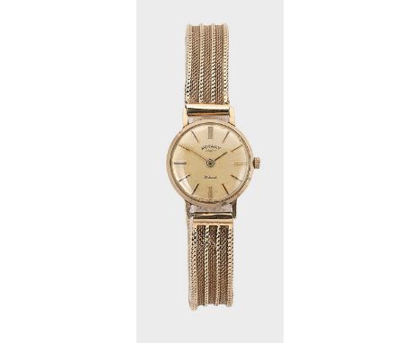 Rotary - A 9ct gold wristwatch, circa 1963, circular champagne dial with gold coloured batons and hands, 21 jewel mechanical 