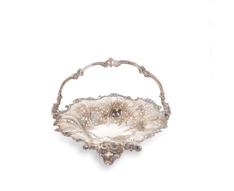 A Victorian silver swing handled fruit basket, mark of Henry Wilkinson &amp; Company, Sheffield 1845, of circular fluted form
