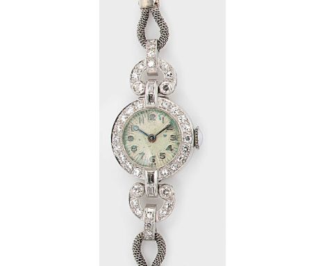 Unsigned - A diamond set cocktail watch with a later 9ct gold bracelet, circa 1960, circular cream coloured 'sunburst' dial w