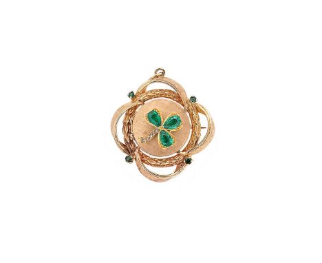 A gemset shamrock locket/brooch, central section with an applied shamrock set with three pear shaped emeralds and five rose c