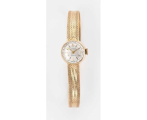 Berthoud, - A French 18ct gold wristwatch, circa 1960, circular silvered dial with gold coloured batons and hands and diamond