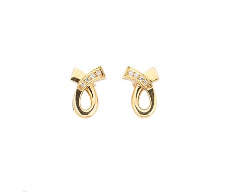 A pair of 18ct gold diamond set ear studs, each set with four graduated round brilliant cut diamonds, length 2cm, width 1.3cm