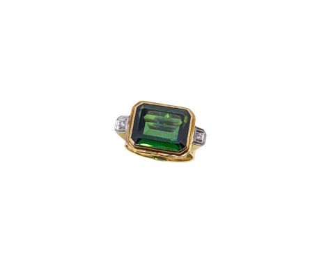 A tourmaline and diamond dress ring,  octagonal tourmaline, approximately 15 x 12mm, estimated approximate weight 8.20ct, fla