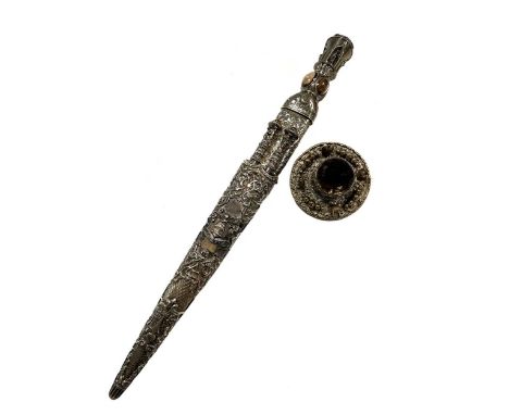 A silver plated Highlander's dress dirk together with a plaid brooch, the dirk with decorative handle featuring four oval cab