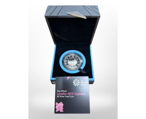 A Royal Mint 2012 London Olympics 0.925 silver five pound proof coin, 28.28g, boxed with certificate of authenticity.