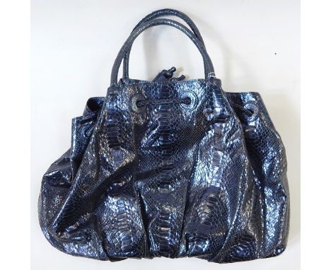 Vintage Carlos Faluchi leather handbag printed as snakeskin, in metallic blue with floral lining 