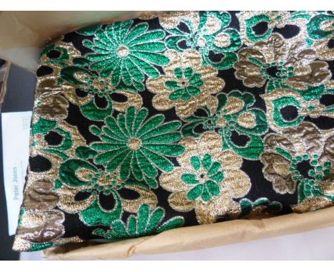 Three and a half yards of lurex in gold, green and silver on a black ground, with original receipt from Peter Jones dated 3rd