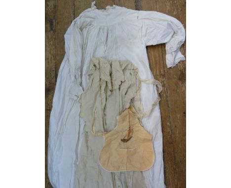 Two Victorian nightdresses, a woollen embroidered baby's cape, a vintage silk blouse and skirt and two vintage bibs (1 box) 