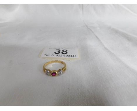 An 18ct yellow gold diamond and ruby ring