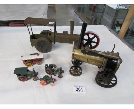 An early Tri-ang tinplate steam roller with wooden wheels a Mamod steam engine and other models