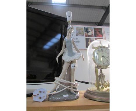 A LLadro figure as a table lamp