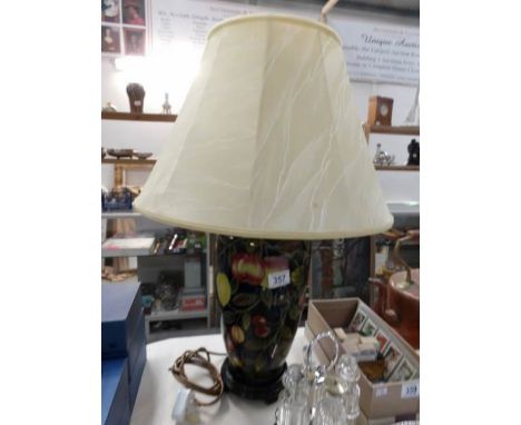 A fruit decorated table lamp