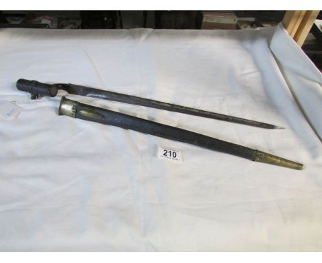 A British pattern 1853 3 band Enfield socket bayonet with scabbard (blade length approximately 17")