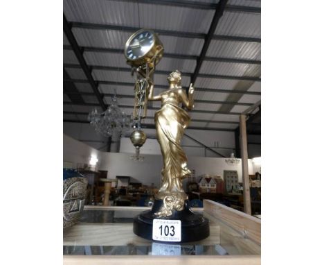 A spelter figure mystery clock