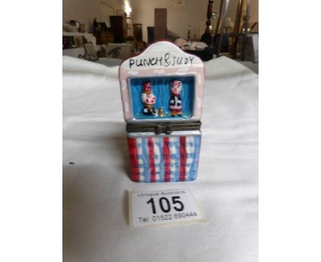 A ceramic punch and judy match holder
