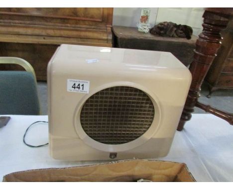 A retro pink bakelite speaker