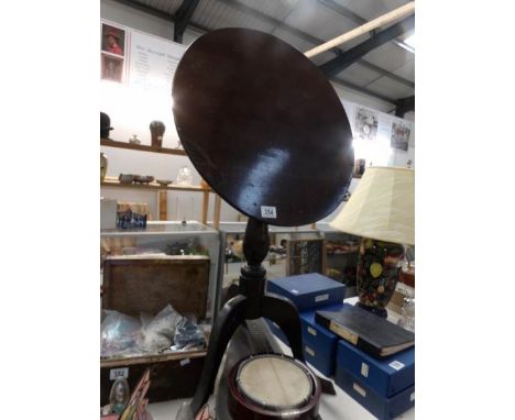 A tip top tripod table